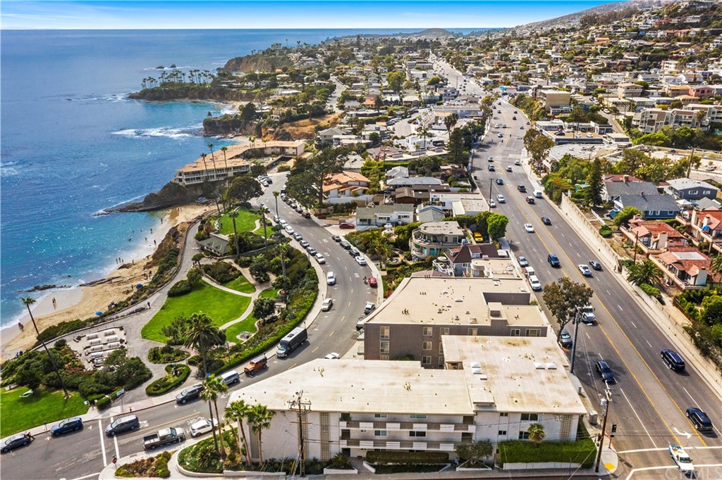 an aerial view of a residential apartment building with outdoor space