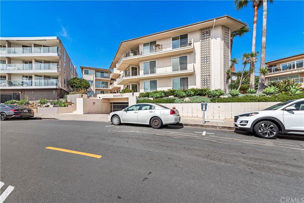 520 Cliff Drive, Unit 303 Laguna Beach, CA 92651 - Photo 29 of 46 a car parked in front of a house