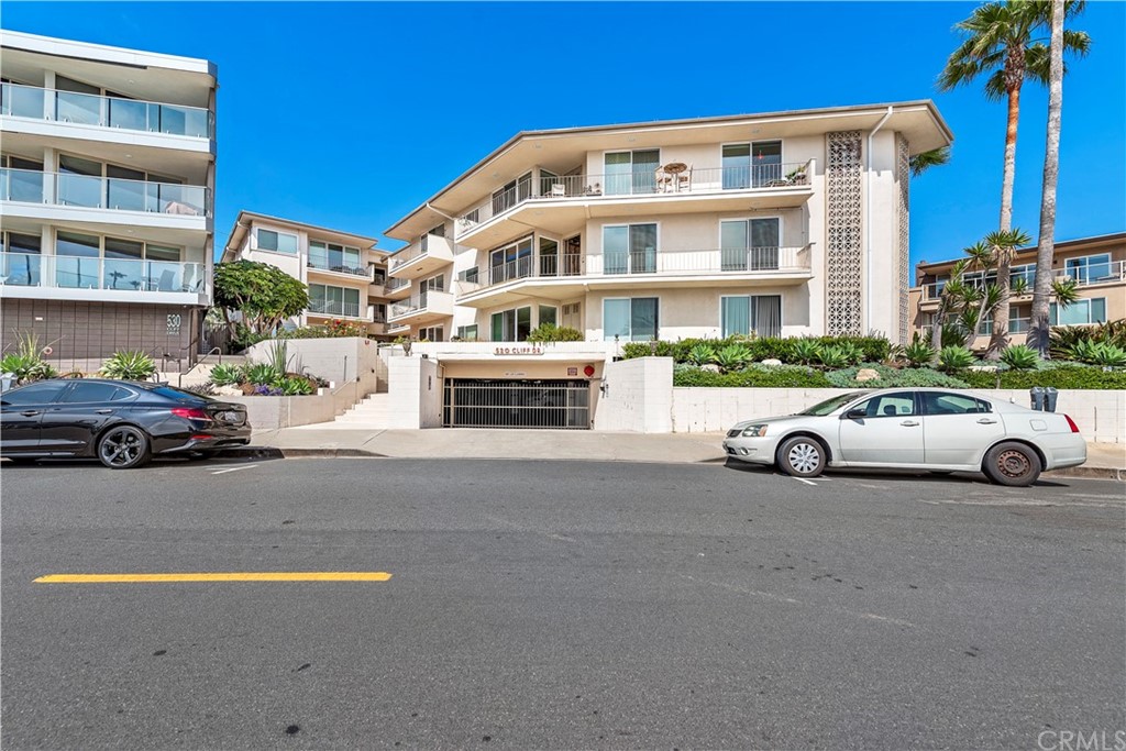 520 Cliff Drive, Unit 303 Laguna Beach, CA 92651 - Photo 31 of 46 a view of a cars park in front of a building