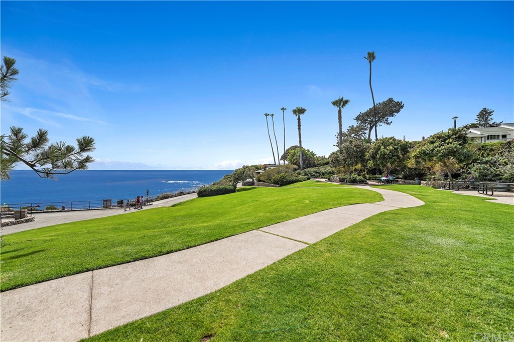 520 Cliff Drive, Unit 303 Laguna Beach, CA 92651 - Photo 32 of 46 a view of a garden with a house
