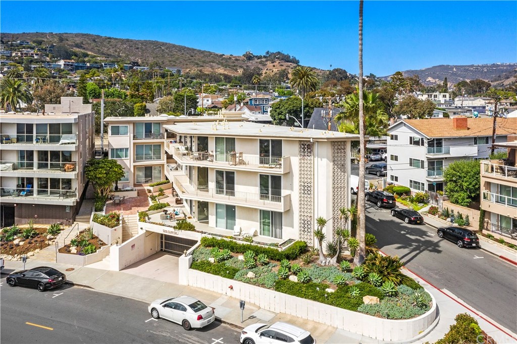 520 Cliff Drive, Unit 303 Laguna Beach, CA 92651 - Photo 35 of 46 a view of a city with tall buildings