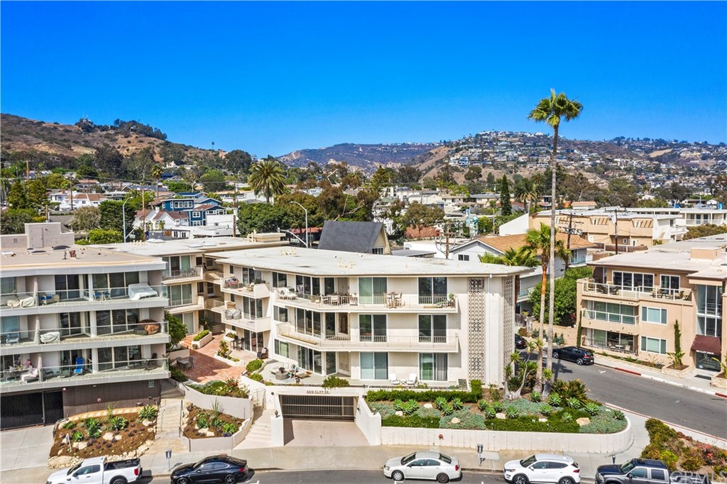 520 Cliff Drive, Unit 303 Laguna Beach, CA 92651 - Photo 37 of 46 a view of a city that has tall buildings