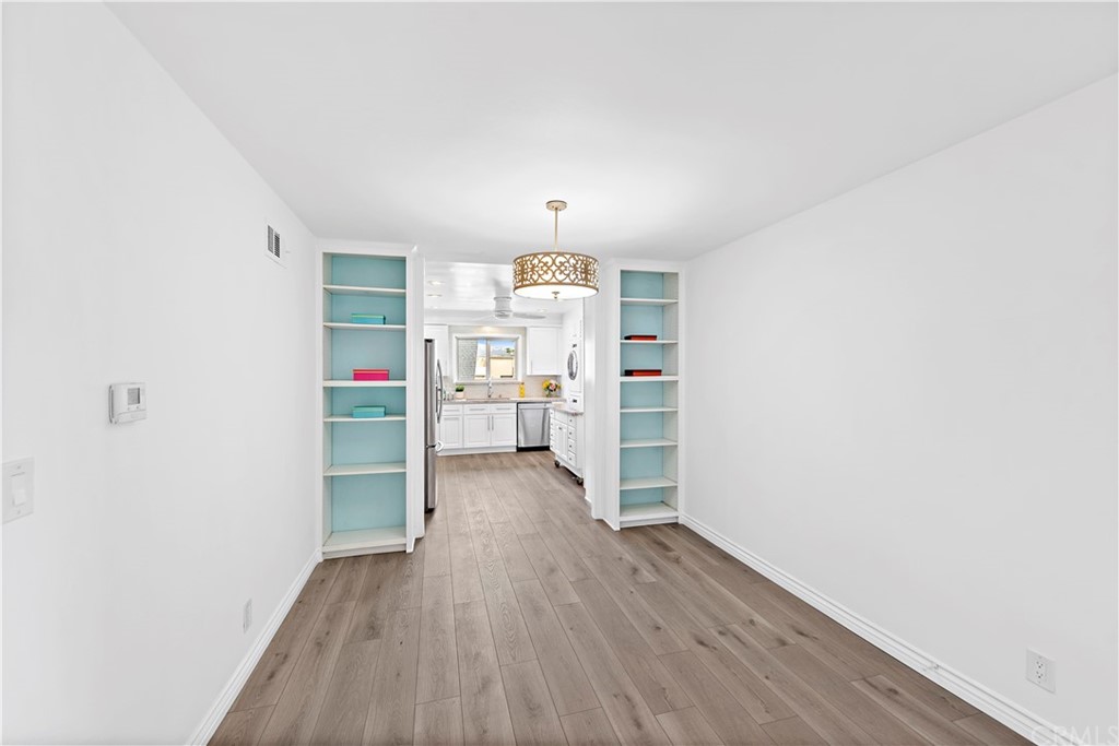 520 Cliff Drive, Unit 303 Laguna Beach, CA 92651 - Photo 10 of 46 a view of livingroom with furniture and wooden floor