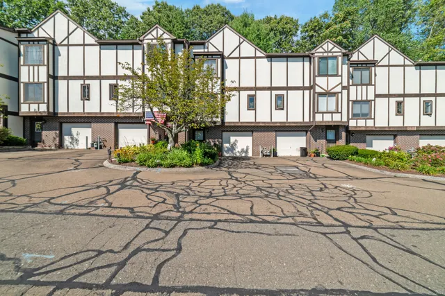 a view of a building with a street