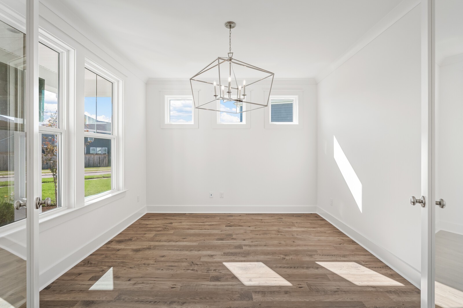 918 Heatherfield Ln Spring Hill Spring Hill, TN 37174 - Photo 4 of 35 a view of a room with wooden floor and windows