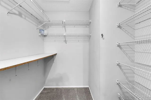 a house view with swimming pool in front of it