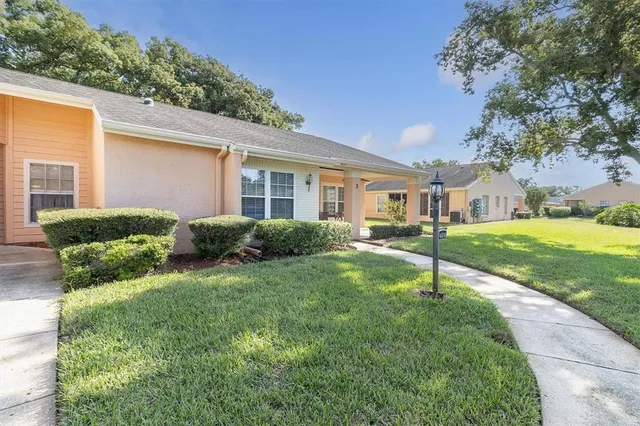 a house view with a lake view