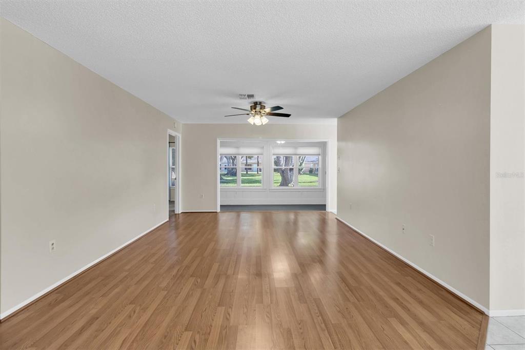 4814 Grist Mill Circle New Port Richey, FL 34655 - Photo 5 of 63 a view of an empty room and a window