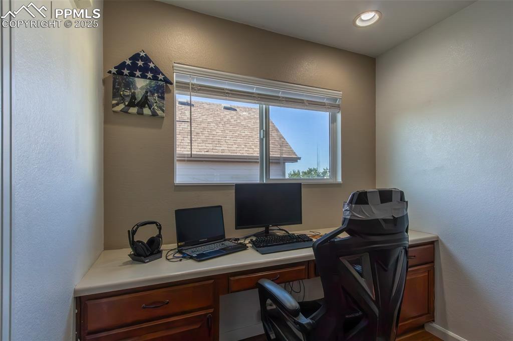 7544 Jaoul Point Peyton, CO 80831 - Photo 15 of 37 a view of a workspace with furniture