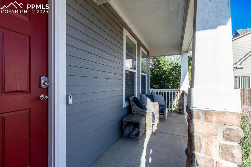 7544 Jaoul Point Peyton, CO 80831 - Photo 4 of 37 a view of two chairs in the balcony