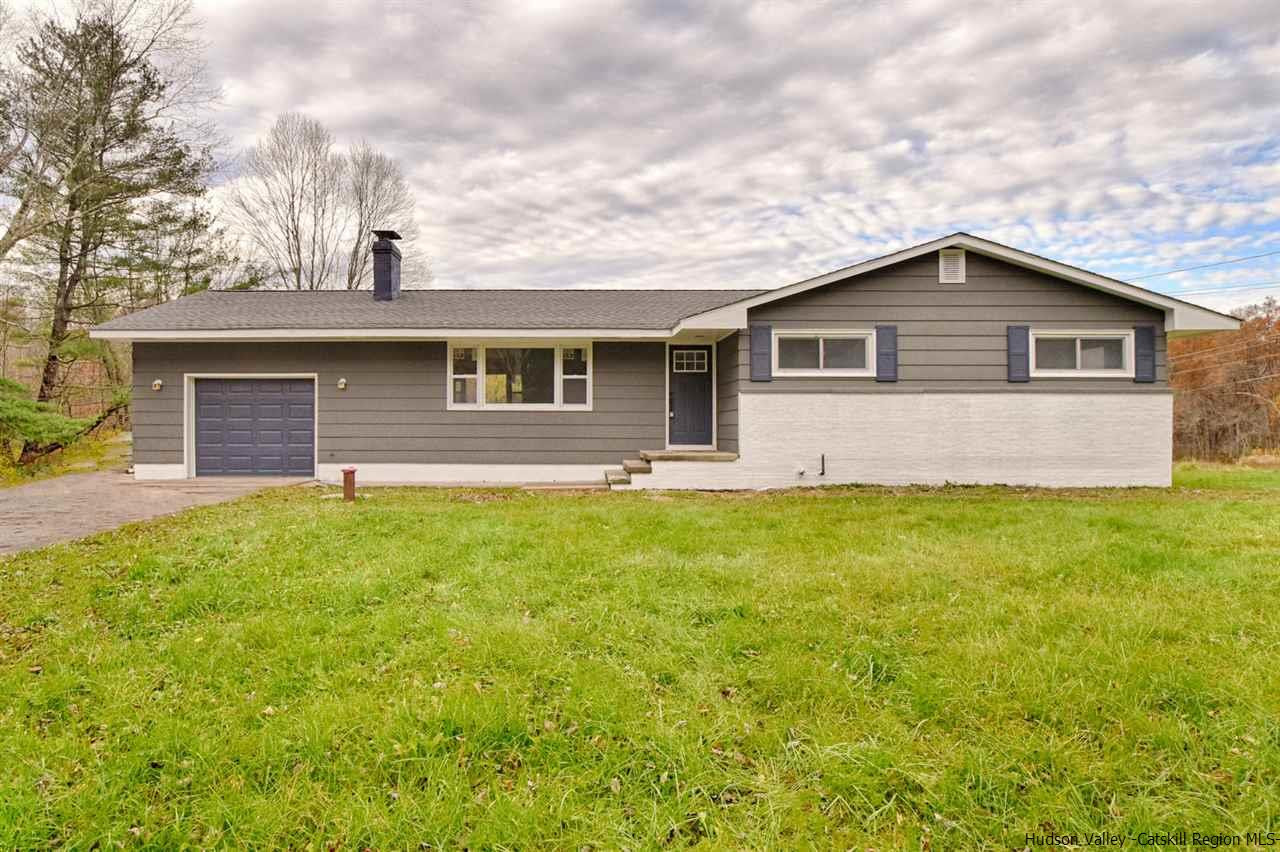 2386 Bruynswick Road Wallkill, NY 12589 - Photo 1 of 25 a front view of house with yard and green space