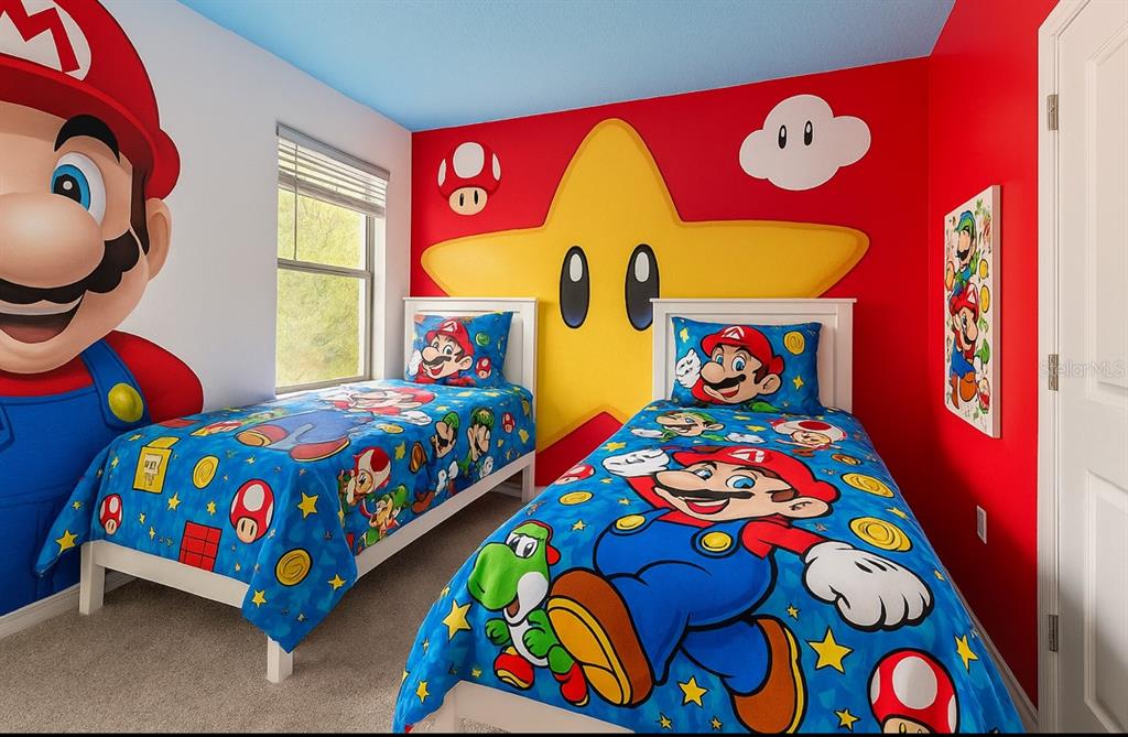 1326 Butterfly Orchid Road Davenport, FL 33837 - Photo 26 of 54 a bedroom with a bed a window and painting on the wall