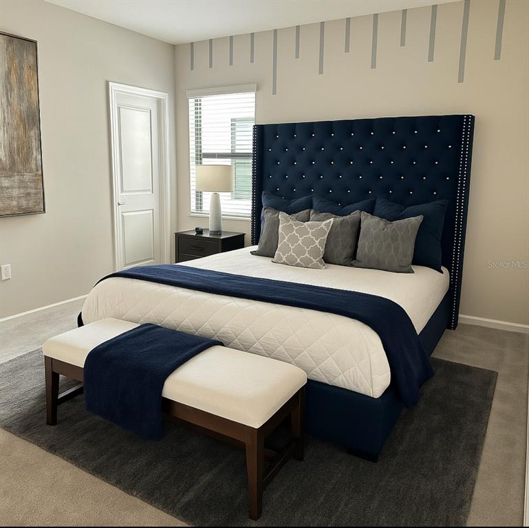 1326 Butterfly Orchid Road Davenport, FL 33837 - Photo 36 of 54 a bedroom with a bed a dresser and mirror