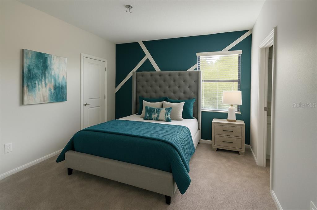 1326 Butterfly Orchid Road Davenport, FL 33837 - Photo 45 of 54 a bedroom with a bed and a window