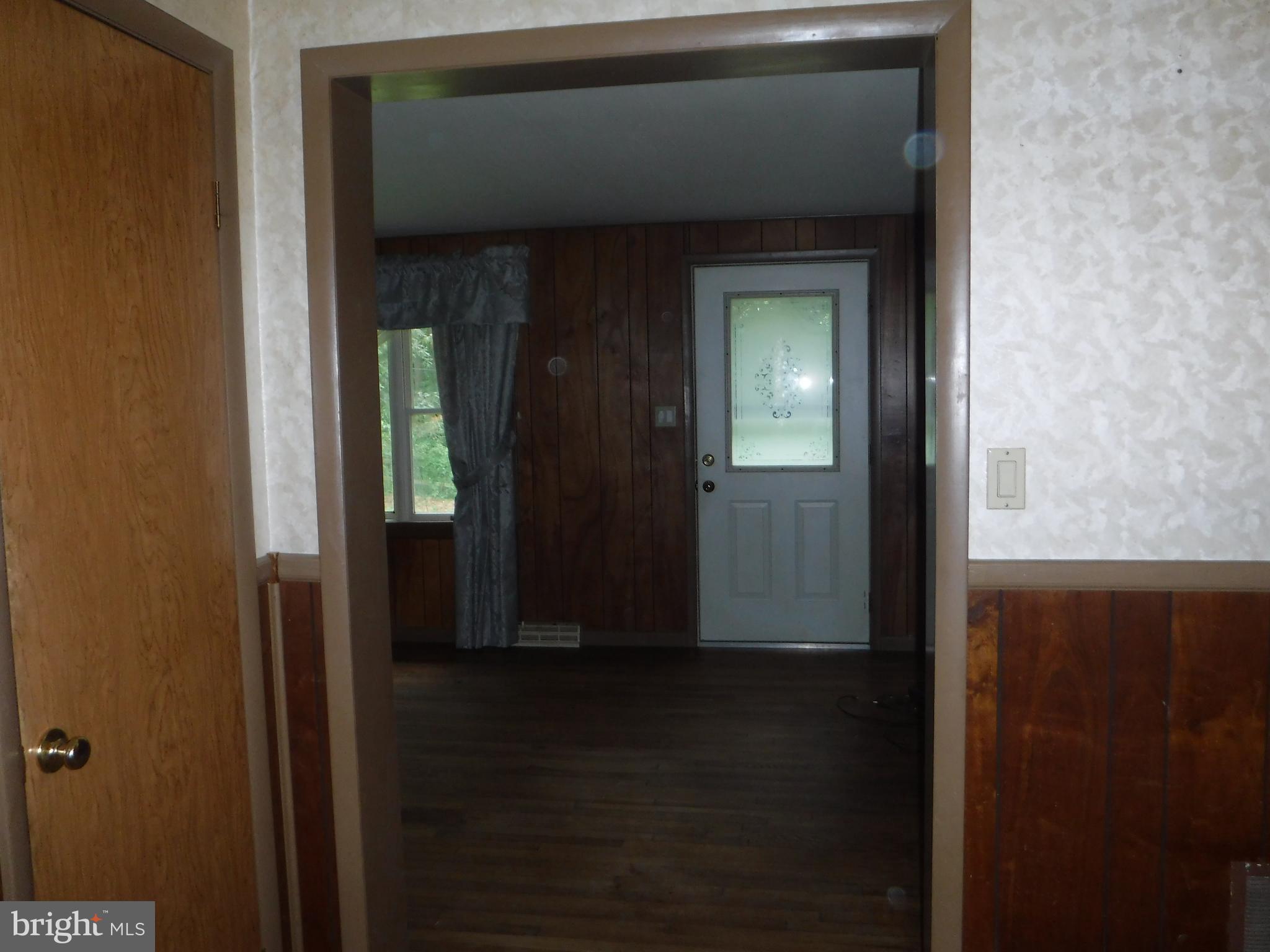 6950 Ridge Road Hanover, MD 21076 - Photo 15 of 29 Dining Room Opens to Living Room
