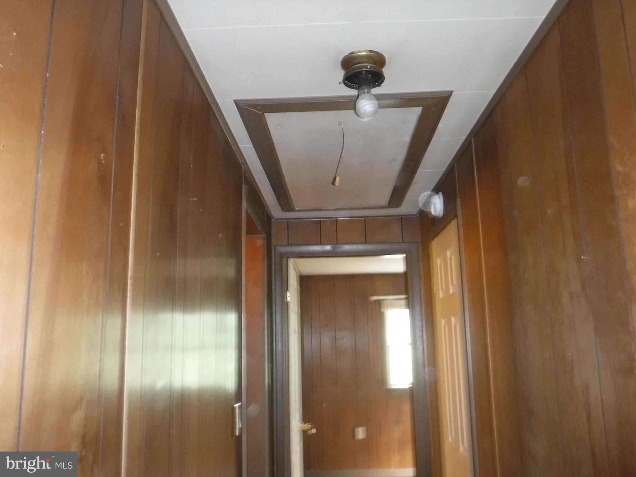 6950 Ridge Road Hanover, MD 21076 - Photo 25 of 29 Attic Stairs in Hallway