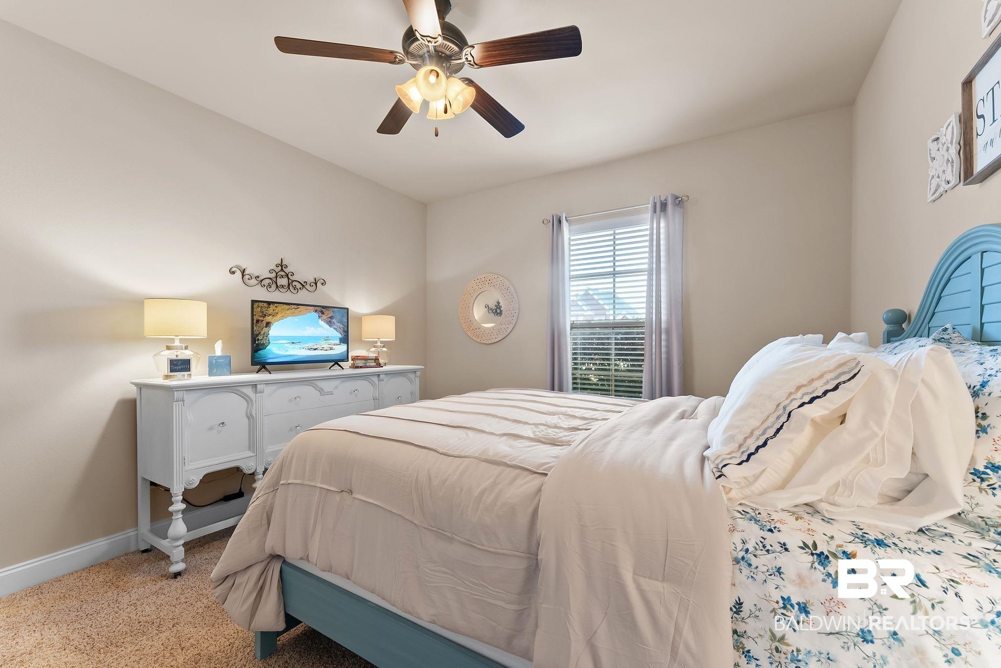 7015 Rocky Rd Loop Gulf Shores, AL 36542 - Photo 25 of 41 Carpeted bedroom with baseboards and a ceiling fan