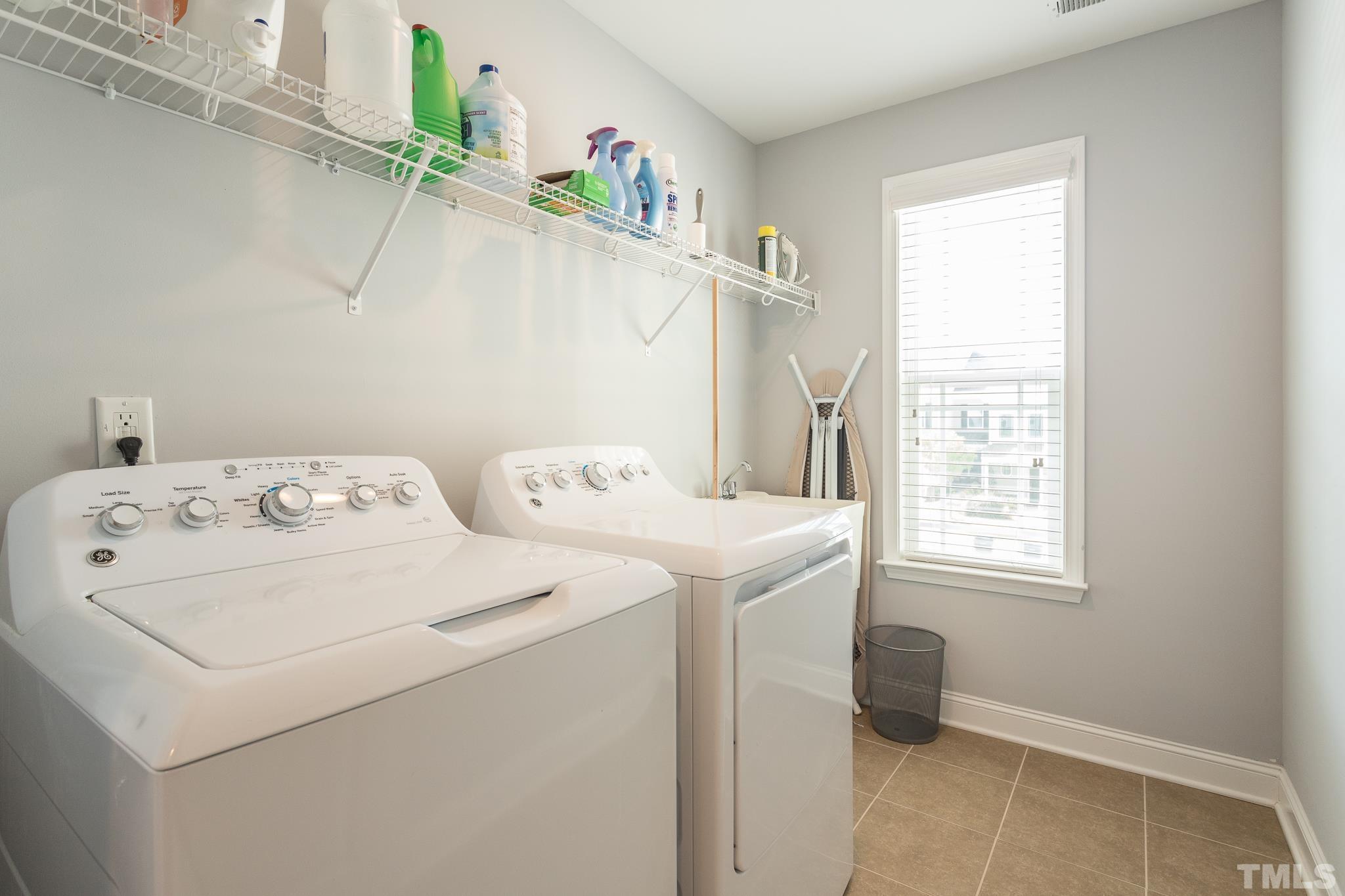 114 Willow View Lane Apex, NC 27539 - Photo 30 of 40 a utility room with dryer and washer