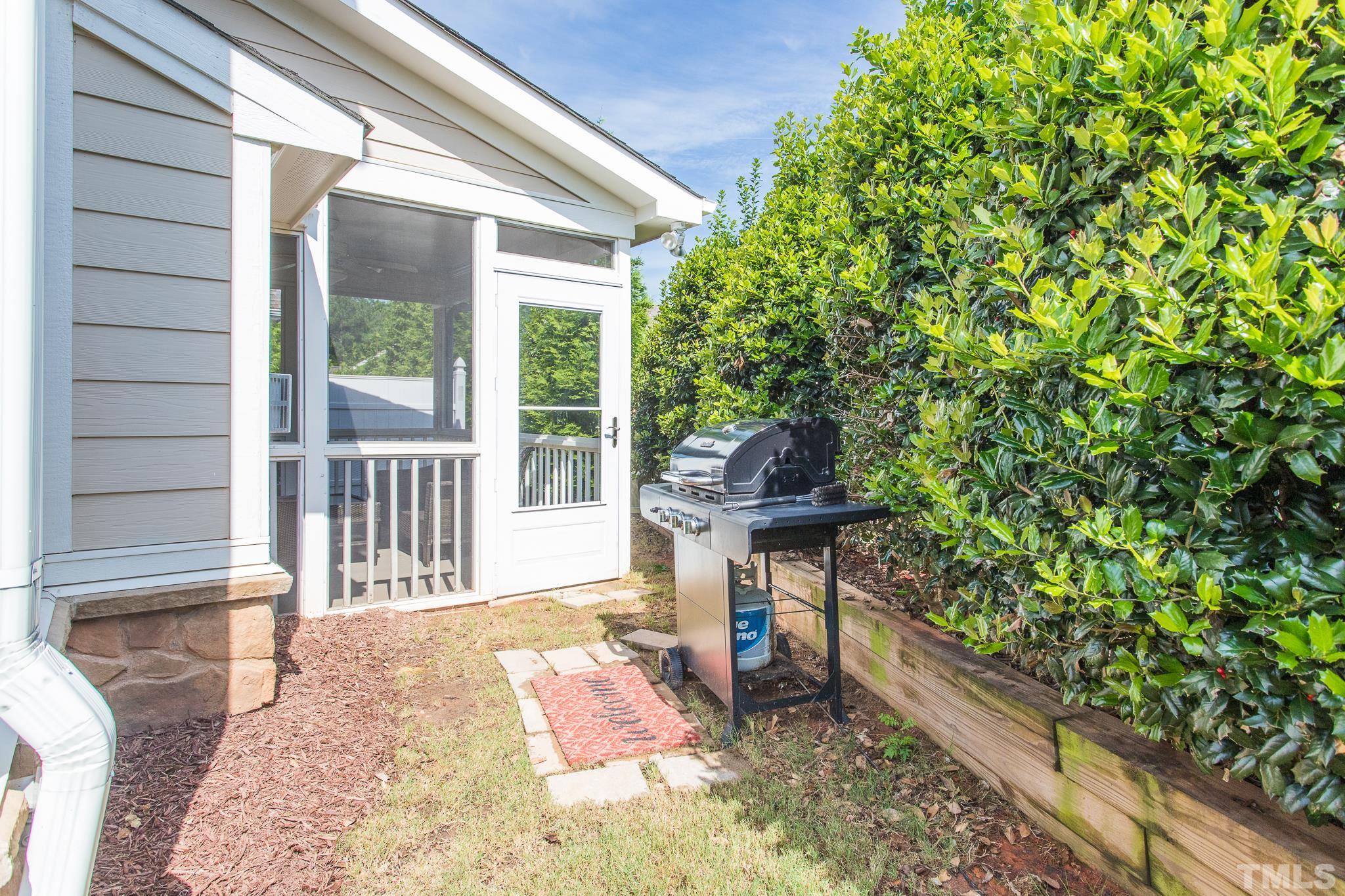 114 Willow View Lane Apex, NC 27539 - Photo 32 of 40 a bench sitting in front of a window