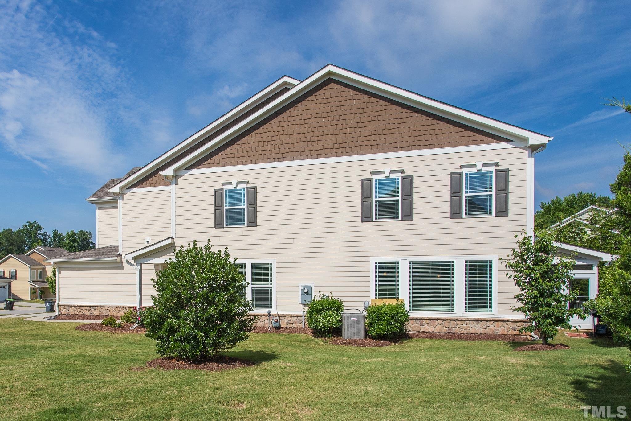 114 Willow View Lane Apex, NC 27539 - Photo 34 of 40 a front view of a house with a yard