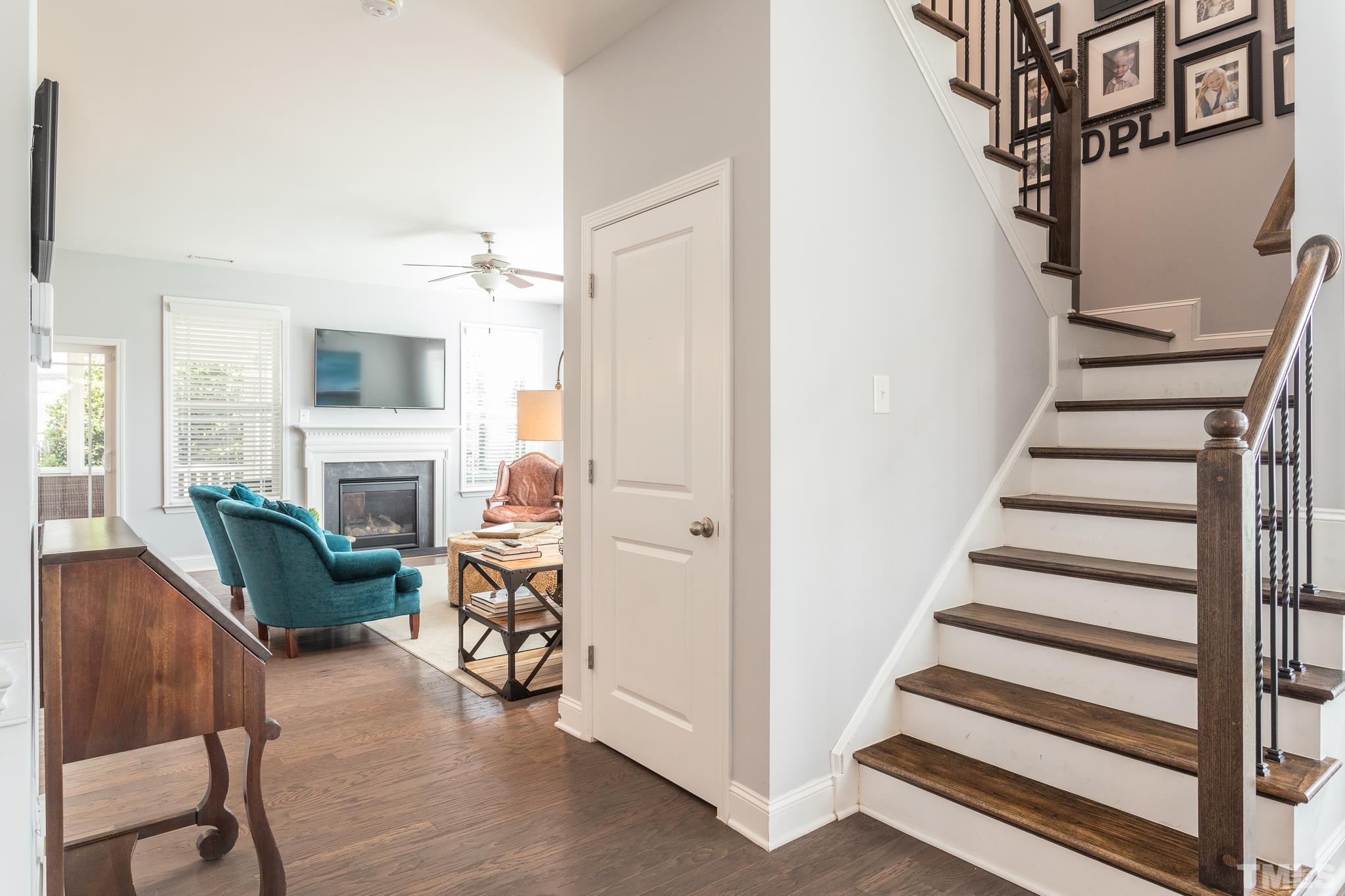 114 Willow View Lane Apex, NC 27539 - Photo 5 of 40 a view of a livingroom with furniture and a fireplace