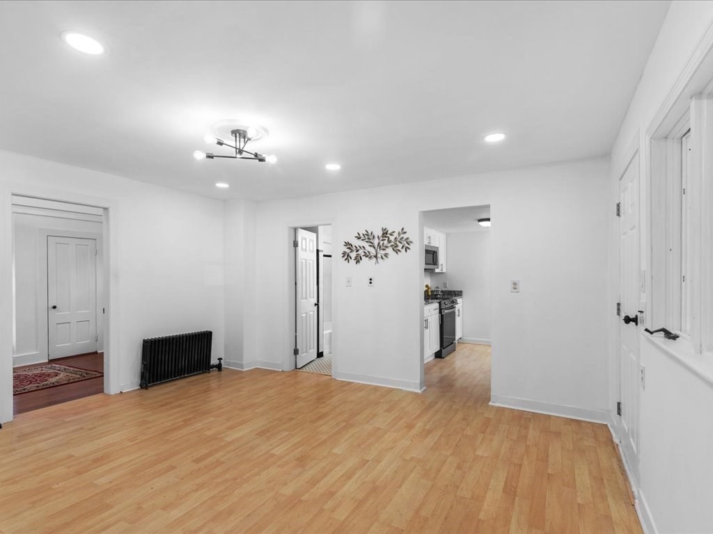 21 Ellis Street Framingham, MA 01701 - Photo 17 of 40 a view of a livingroom with a fireplace