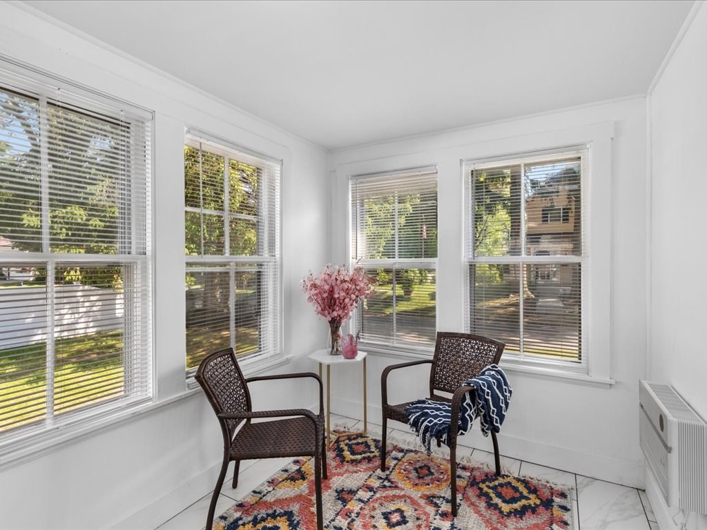 21 Ellis Street Framingham, MA 01701 - Photo 19 of 40 a dining room with furniture and a window