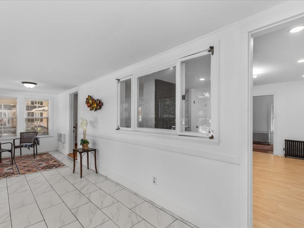 21 Ellis Street Framingham, MA 01701 - Photo 23 of 40 view of living room with furniture and wooden floor