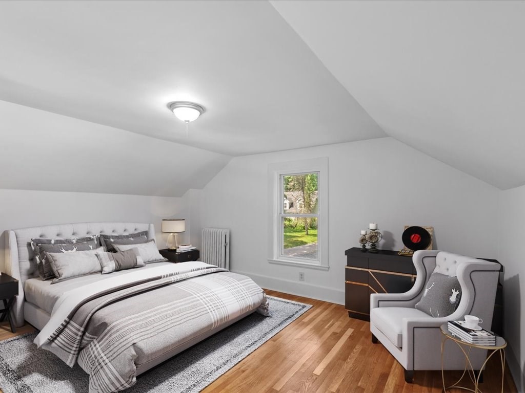 21 Ellis Street Framingham, MA 01701 - Photo 30 of 40 a bedroom with a bed and a window