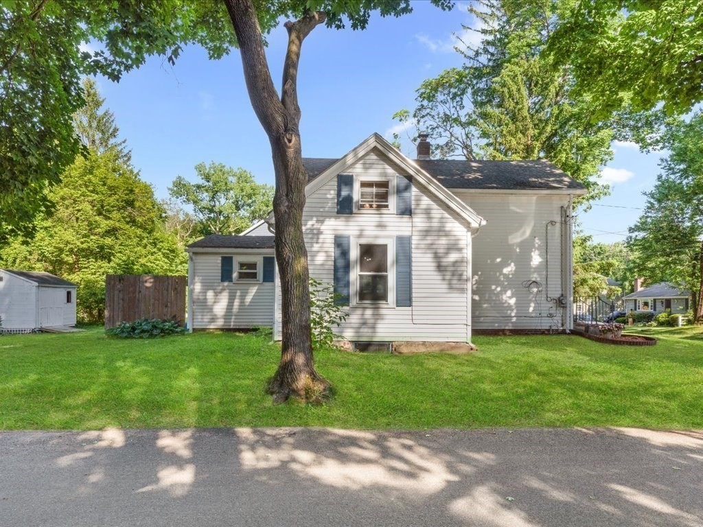 21 Ellis Street Framingham, MA 01701 - Photo 3 of 40 a front view of house with yard and green space