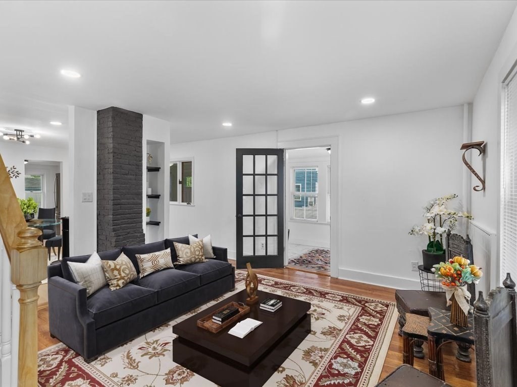 21 Ellis Street Framingham, MA 01701 - Photo 5 of 40 a living room with furniture and a couch