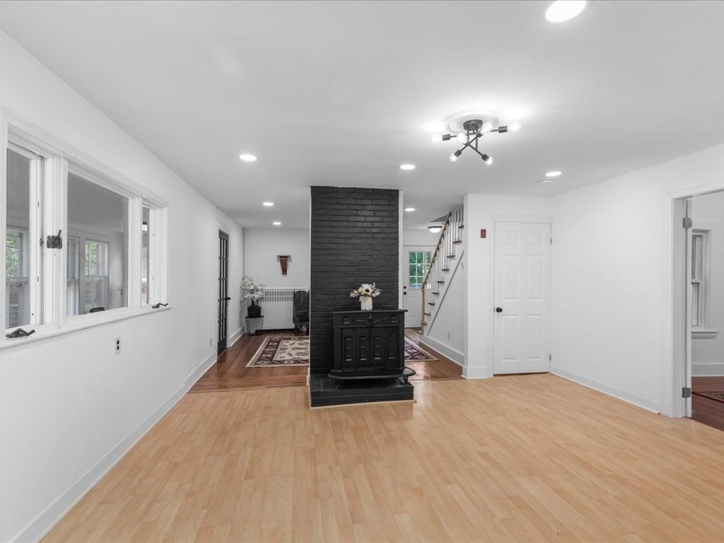 21 Ellis Street Framingham, MA 01701 - Photo 10 of 40 a living room with furniture and wooden floor