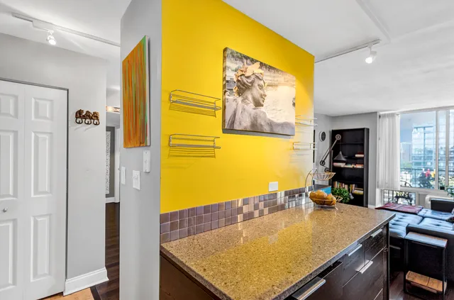 a room with pool table and a table