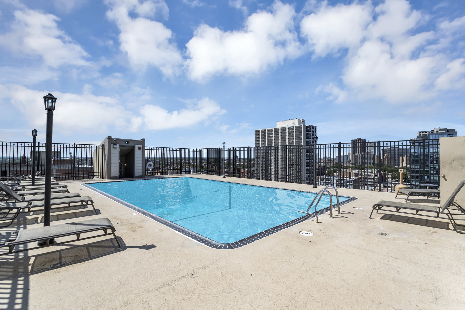 450 West Briar Place, Unit 13G Chicago, IL 60657 - Photo 26 of 34 a view of a swimming pool with a terrace