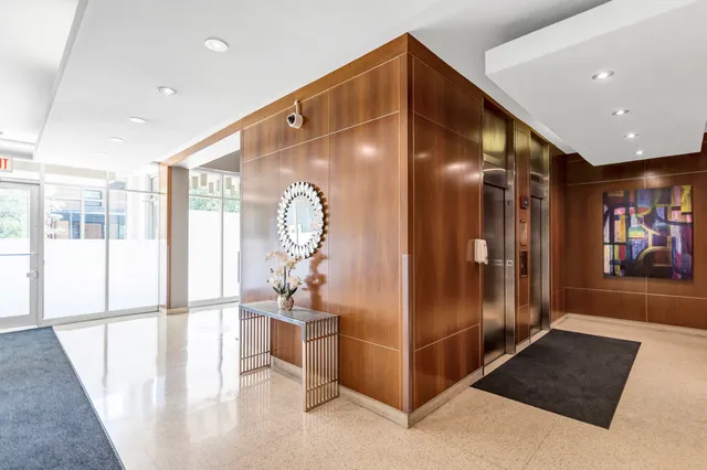 a view of a hallway with windows