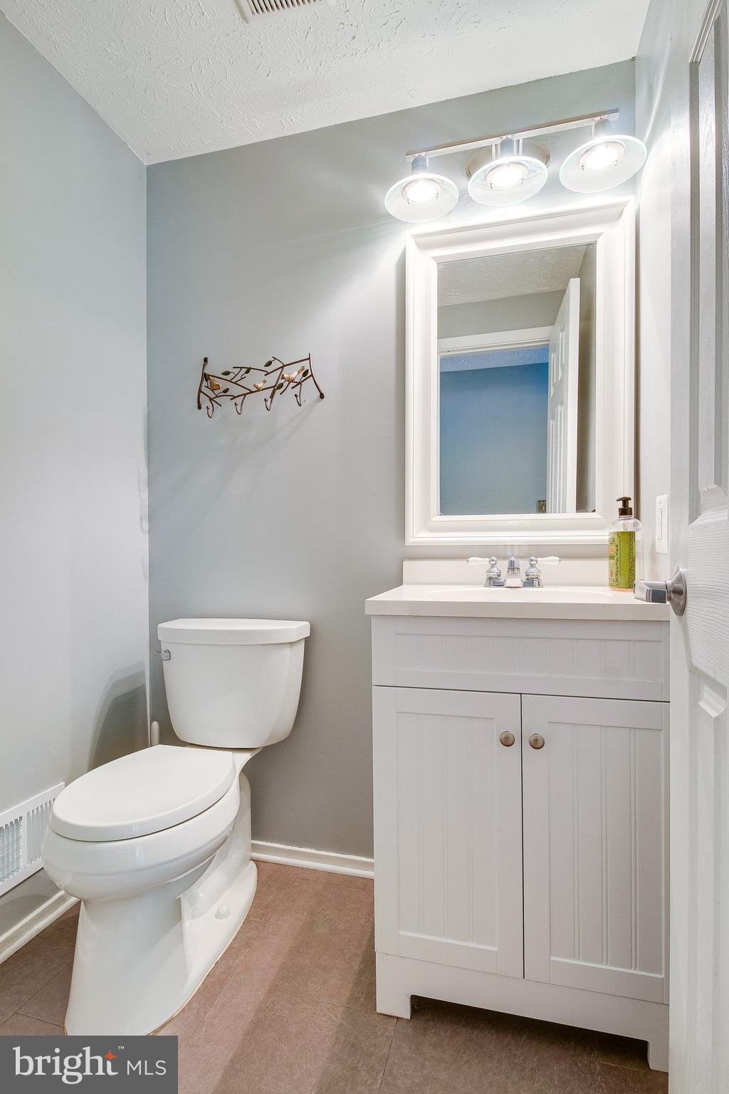 8301 Old Tree Court Springfield, VA 22153 - Photo 15 of 30 Half bath has been updated