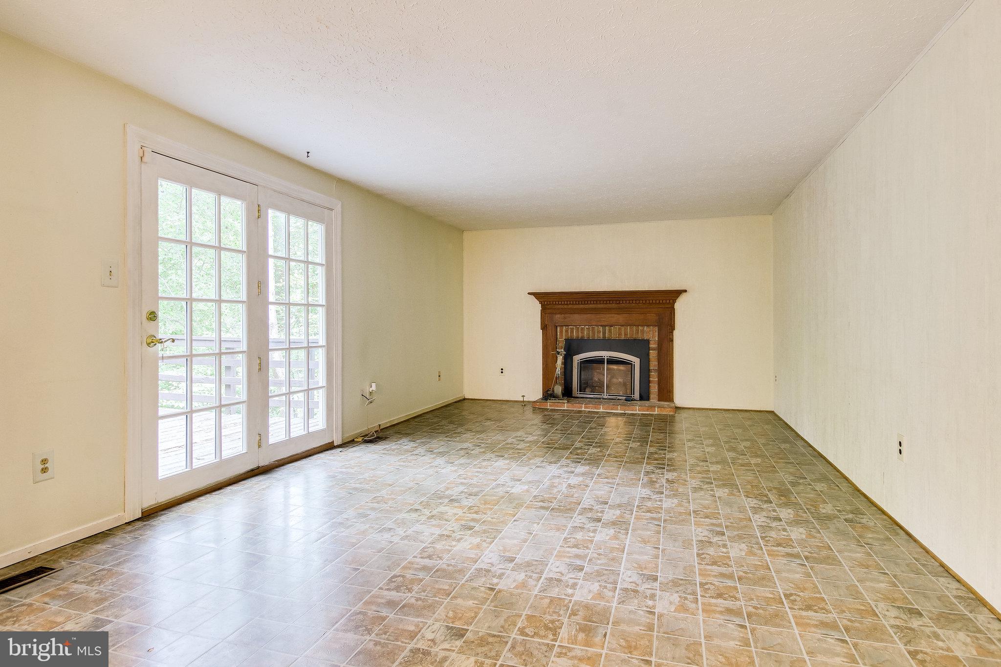 8301 Old Tree Court Springfield, VA 22153 - Photo 16 of 30 Family room with gas fireplace