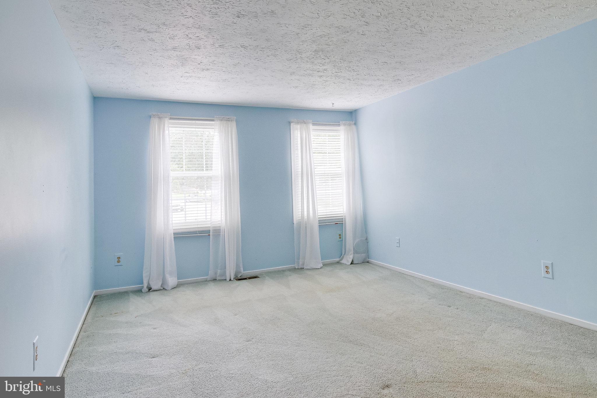 8301 Old Tree Court Springfield, VA 22153 - Photo 20 of 30 Owners' bedroom is large and bright