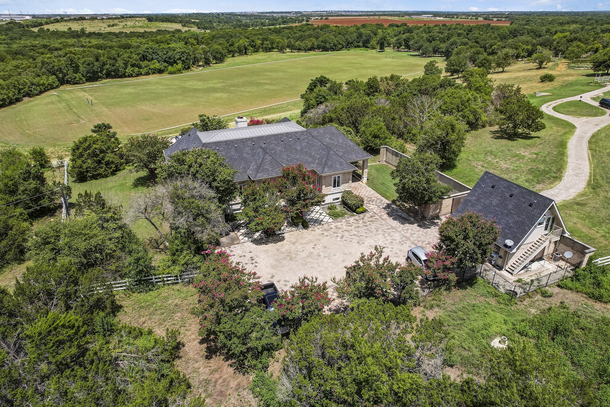 13628 Gregg Manor Road Manor, TX 78653 - Photo 6 of 33 an aerial view of ocean with residential house with outdoor space and river