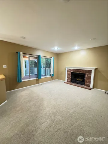 a bedroom with a bed and a mirror