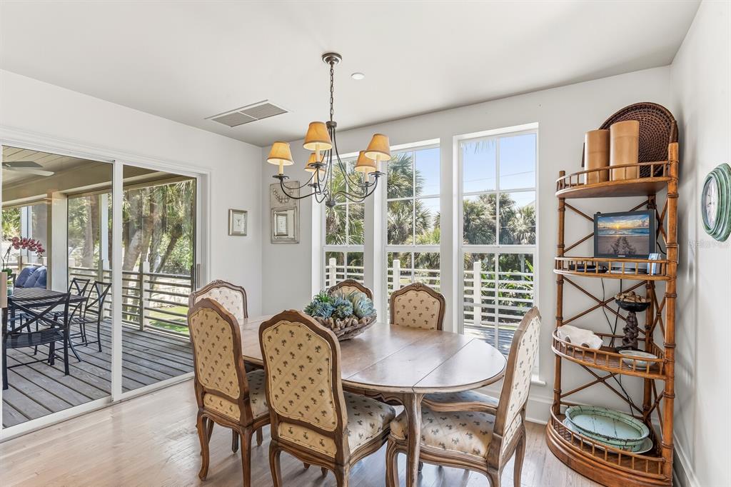 312 Baily Street Boca Grande, FL 33921 - Photo 12 of 41 a view of a dining room with furniture window and outside view
