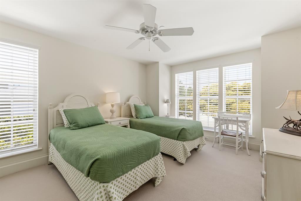 312 Baily Street Boca Grande, FL 33921 - Photo 13 of 41 a living room with furniture and a large window