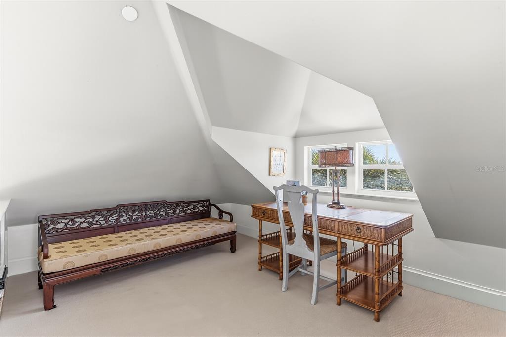 312 Baily Street Boca Grande, FL 33921 - Photo 18 of 41 a dining room with furniture and a window