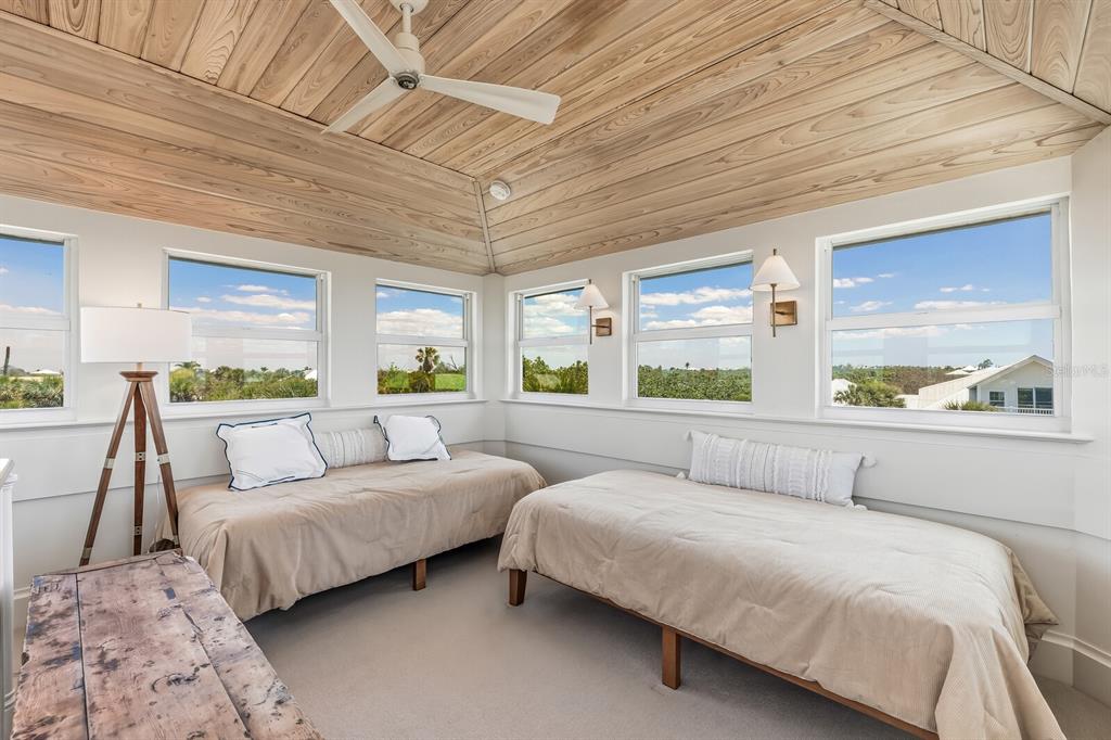 312 Baily Street Boca Grande, FL 33921 - Photo 23 of 41 a living room with furniture and a large window