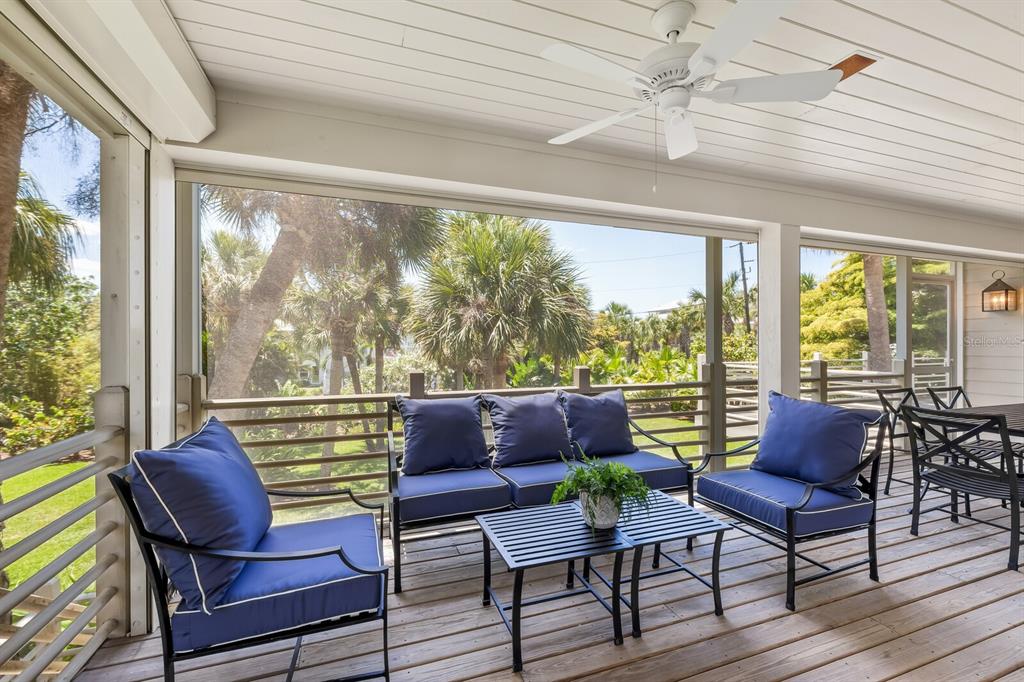 312 Baily Street Boca Grande, FL 33921 - Photo 25 of 41 a outdoor living space with furniture and a potted plant