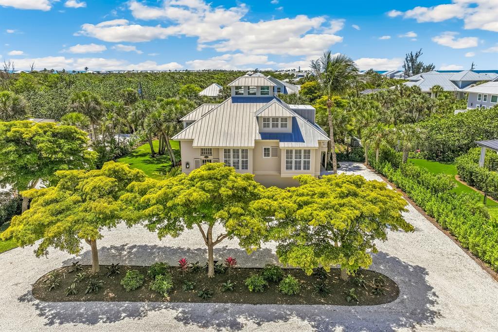 312 Baily Street Boca Grande, FL 33921 - Photo 27 of 41 a view of a garden with a house