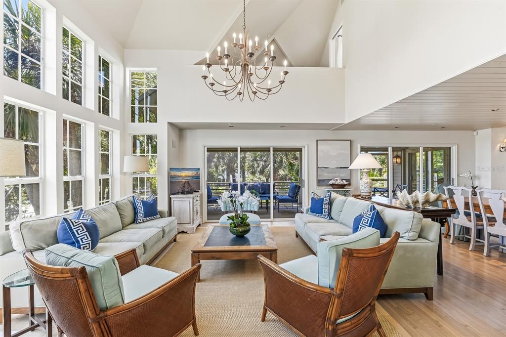 312 Baily Street Boca Grande, FL 33921 - Photo 3 of 41 a living room with fireplace furniture and a large window