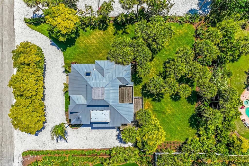 312 Baily Street Boca Grande, FL 33921 - Photo 34 of 41 an aerial view of a house with a garden