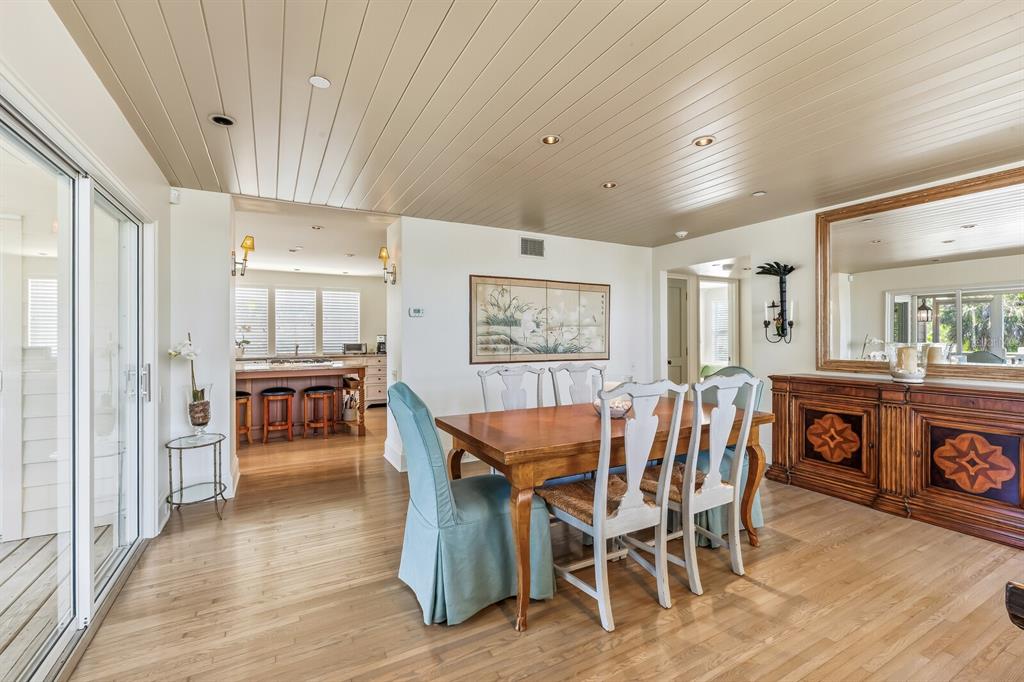 312 Baily Street Boca Grande, FL 33921 - Photo 7 of 41 a view of a dining room with furniture and wooden floor