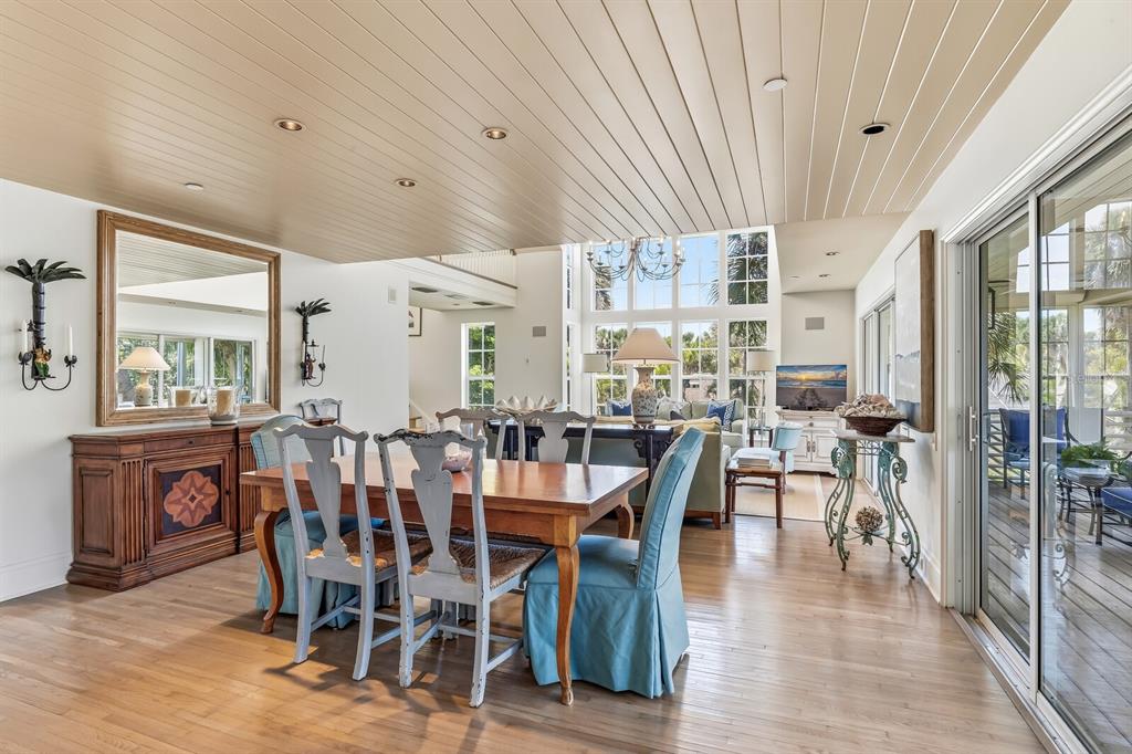 312 Baily Street Boca Grande, FL 33921 - Photo 9 of 41 a view of a dining room with furniture window and wooden floor
